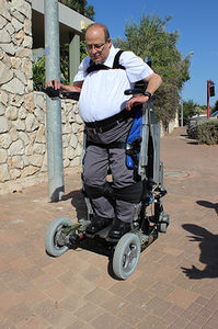 electric stander / walking / with harness / on casters