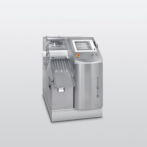 rotary checkweigher / for pharmaceutical applications