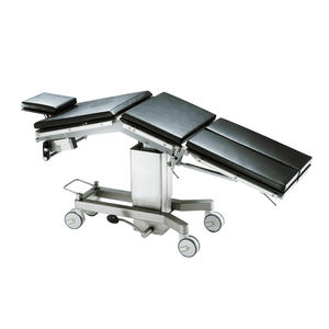 universal operating table / hydraulic / height-adjustable / on casters