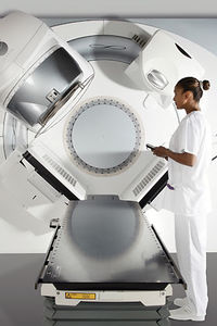 image-guided radiation therapy linear particle accelerator / volumetric-modulated arc therapy / with robotized positioning table