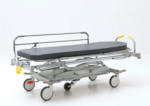 emergency stretcher trolley / electric / height-adjustable / X-ray transparent