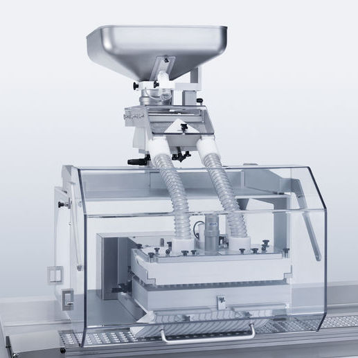 Vibrating dosing feeder SimTap Uhlmann continuous / for capsules