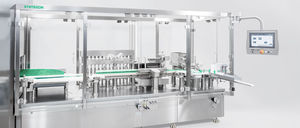 filling and closing machine for the pharmaceutical industry