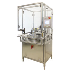 filling and closing machine for the pharmaceutical industry