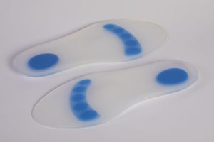 orthopedic insole with heel pad