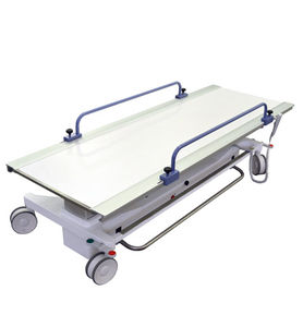 transport stretcher trolley / electric / height-adjustable / X-ray transparent