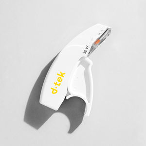 skin closure surgical stapler