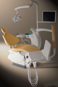 dental treatment unit with hydraulic chair