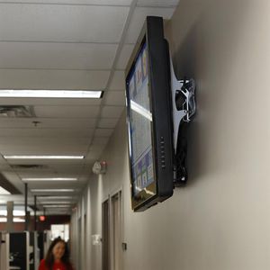 tilting support arm