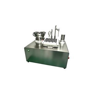 syringe filling and closing machine
