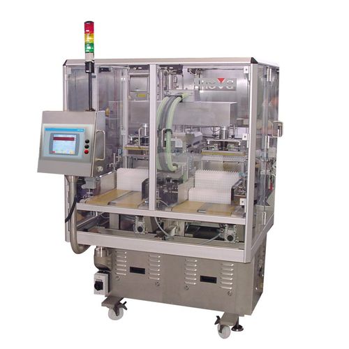 Intermittent packaging machine - Renester TR - OPTIMA - floor-standing / syringe / for the pharmaceutical industry
