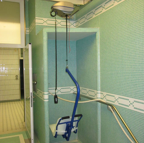 Battery-operated patient lift - DiGi Project - ceiling-mounted / lifting / stainless steel