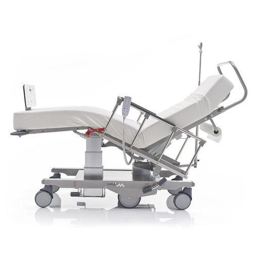 Electric treatment chair - ZeroG - Novak M - 1-section / with footrest / on casters