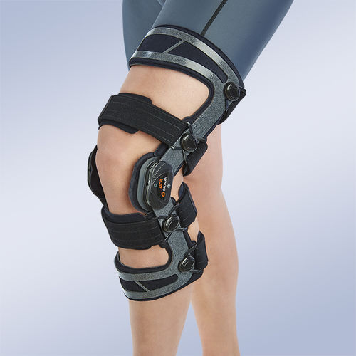 Knee orthosis - OCR100 series - Orliman - knee ligament stabilization / articulated