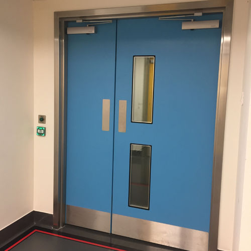 Protection door - Dortek - for healthcare facilities / sliding