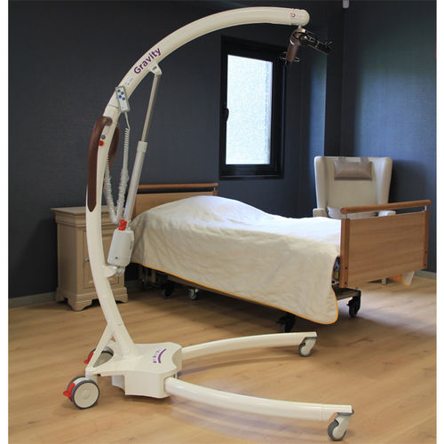 Electric patient lift - Gravity - SCEMED - on casters / height-adjustable / folding