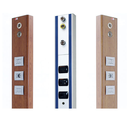 Vertical bed head unit - Mast - Sostel - for intensive care service / for treatment rooms