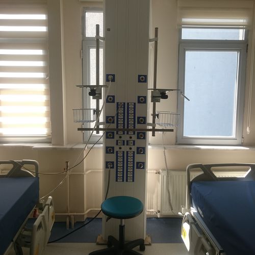Vertical bed head unit - SINAN - Koncare medical Technologie - modular / for intensive care service / with light