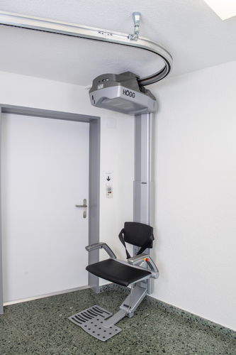 Straight staircase stairlift - SL60 - Högg Liftsysteme - for humans / folding / ceiling-mounted