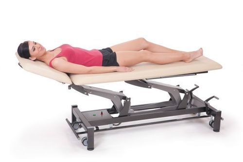 Electric massage table - TATRAS - Chattanooga International - on casters / with headrest / with tilting backrest