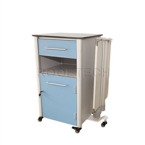 Bedside cabinet on casters - BC010E Plus - Rooe Medical - with over-bed table / with compartments / locking