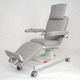 electric treatment chair / 3-section / with legrest / on casters