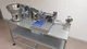 container labeling system / automatic
