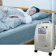 home use oxygen concentrator / on casters / PSA / continuous flow