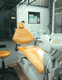 hydraulic dental chair / fixed / orange / height adjustable