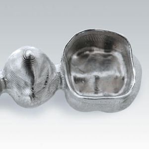 material dentário em titânio