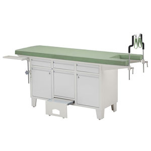 mesa para exame ginecológico