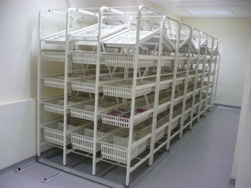 Estante modular - Pegasus Medical Concepts - para cestos / com trilho / de estrutura aberta
