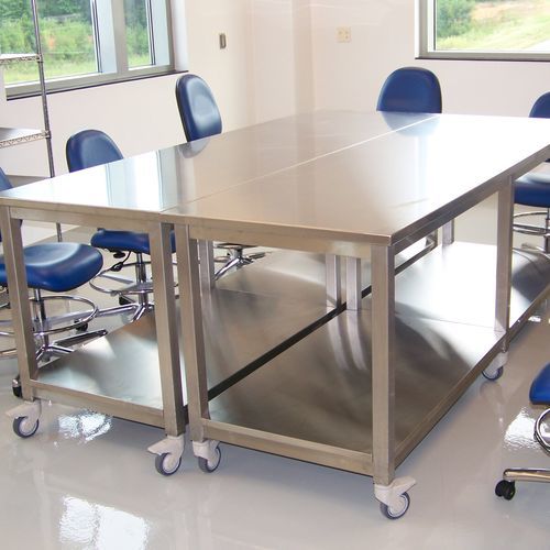 Mesa de trabalho - Mott Manufacturing - de laboratório / retangular / com rodízios