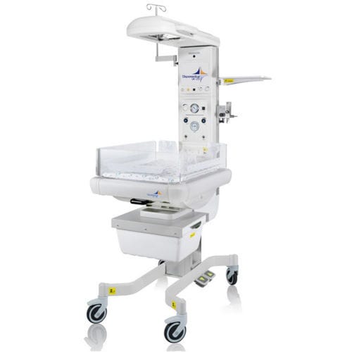 Berço aquecido neonatal com balança - D-500 - DISPOMEDICAL - com rodízios / de altura regulável / com alarme
