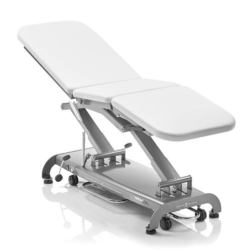 Mesa de exame elétrica - S3 - Novak M - com altura regulável / Trendelenburg / com rodízios