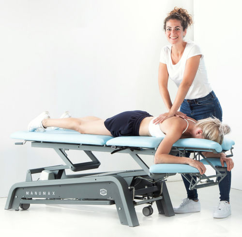 Mesa de massagem elétrica - ManuMax Multi - Enraf-Nonius - com rodízios / com apoio de cabeça / com apoios de braços