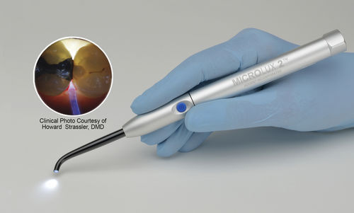 Detector de cáries por transiluminação - Microlux 2  - AdDent, Inc.  