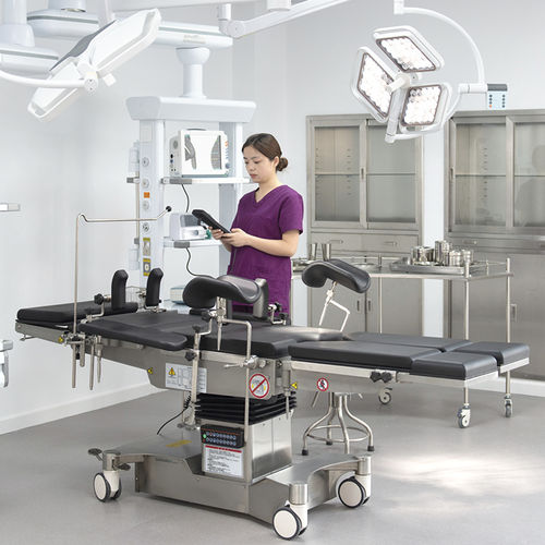 Mesa cirúrgica universal - A302 - Jiangsu Saikang Medical Equipment - para ginecologia / elétrica / com sistema de elevação