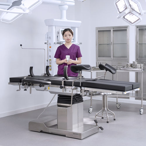 Mesa cirúrgica universal - A202 - Jiangsu Saikang Medical Equipment - para ortopedia / para ginecologia / hidráulica
