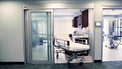 Porta para cuidados intensivos - Dura-Care 7500A - Stanley Access Technologies - de abrir / de vaivém / automática