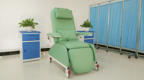 Poltrona elétrica para coleta de sangue - PY-YD-810 upgrade - Nanning Passion Medical Equipment - de 3 seções / com rodízios / Trendelenburg