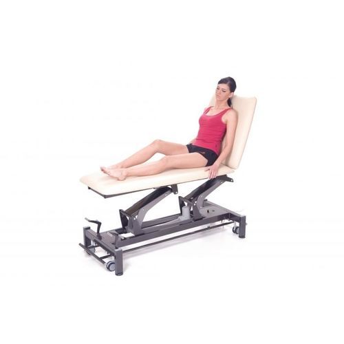 Mesa de massagem elétrica - TATRAS GERLACH - Chattanooga International - com rodízios / com encosto regulável / articulada em 2 seções