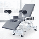 mesa para exame ginecológico / para fisioterapia / elétrica / com altura regulável