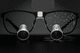 lupa binocular com armação